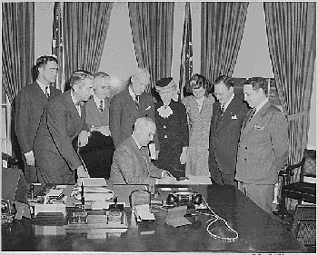 President Truman with members of the National Conference on Prevention and Control of Juvenile Delinquency, 1948. (National Archives)